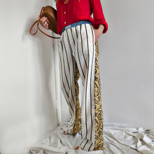 Carica l'immagine nel visualizzatore di Gallery, Pantalone crema a righe nere e rame con retro giallo e fiori testa di moro