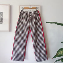 Load image into Gallery viewer, White and brown gingham trousers with palinstrawberry red back
