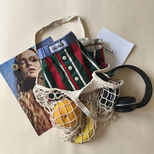 Load image into Gallery viewer, Red-and-green striped boxer shorts with a floral back with pockets
