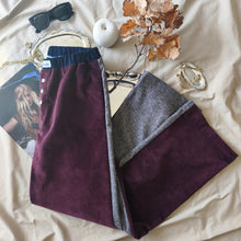 Load image into Gallery viewer, Burgundy night-coloured pinstriped velvet trousers with a salt-and-pepper partridge-eye pattern back 
