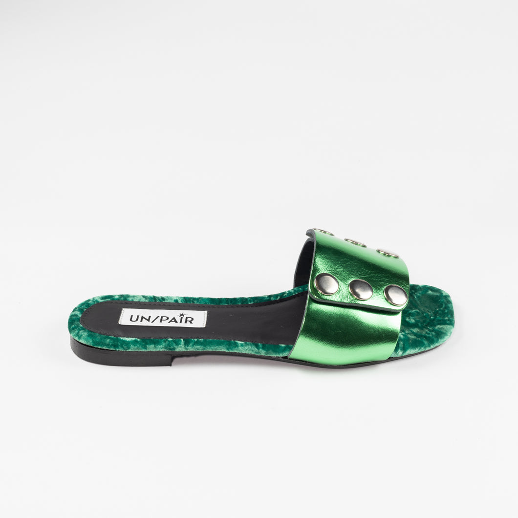 UN/PAIR's emerald green sandal with third silver colored mask