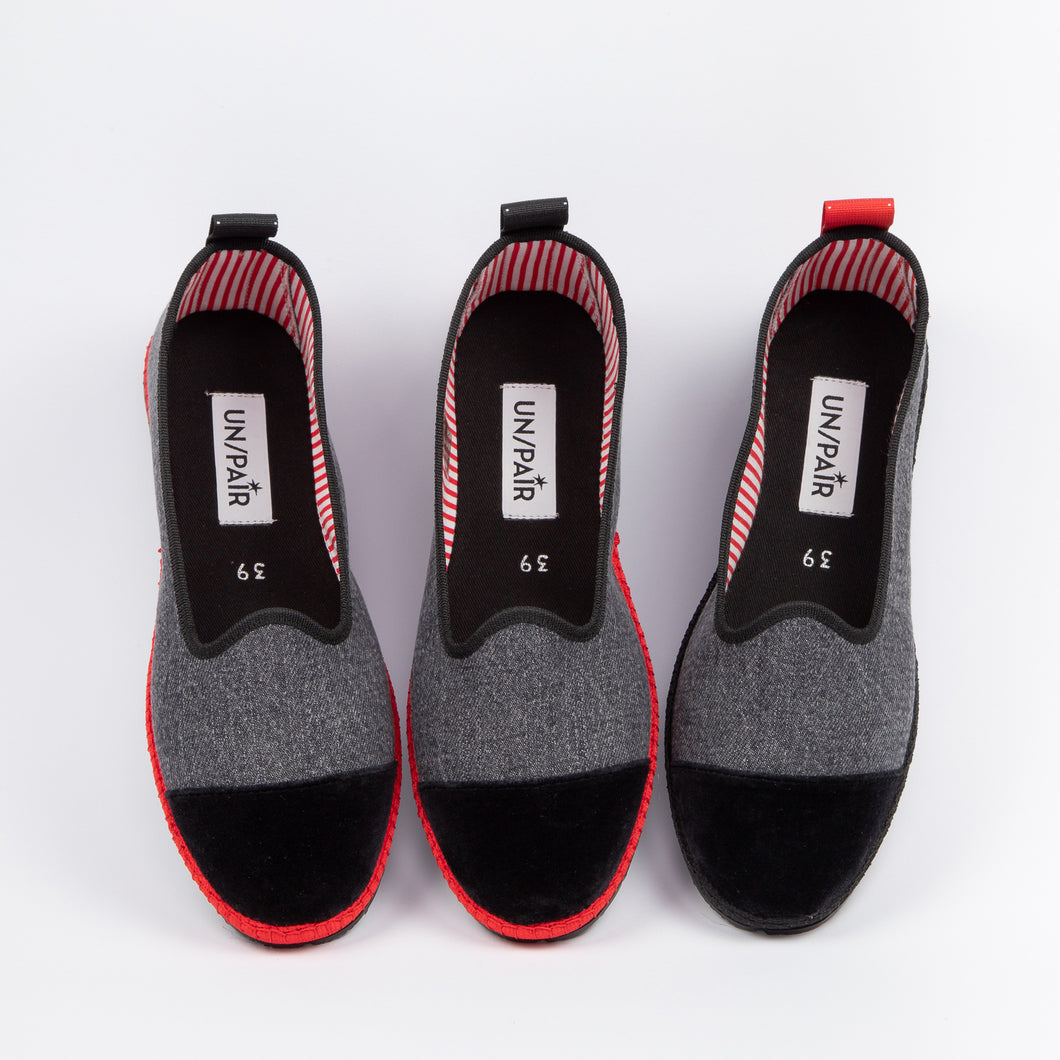 Grey UN/PAIR’s Friulan with a red ribbon