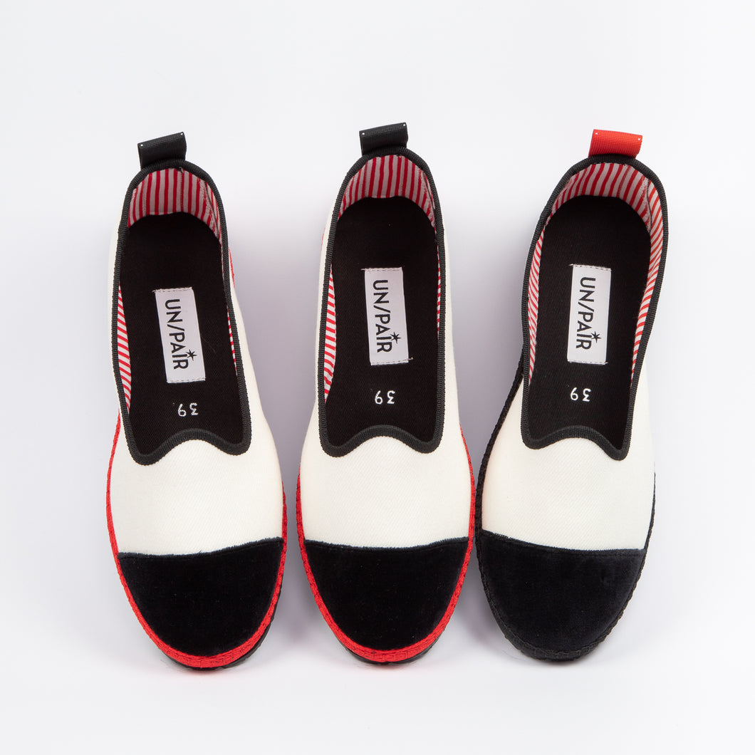 Ivory UN/PAIR’s Friulan with a red ribbon